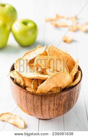 Dried Apples In A Wooden Bowl Ripe Green Apples On The Table