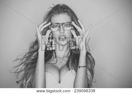 Woman With Big Breasts Wears Old Fashioned Eyeglasses For Vision. Optics Shop Concept. Sexy Nude Gir