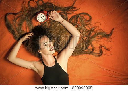 Time Management, Perfect Morning. Happy Woman Sleep On Floor With Alarm Clock. Woman With Long Hair 