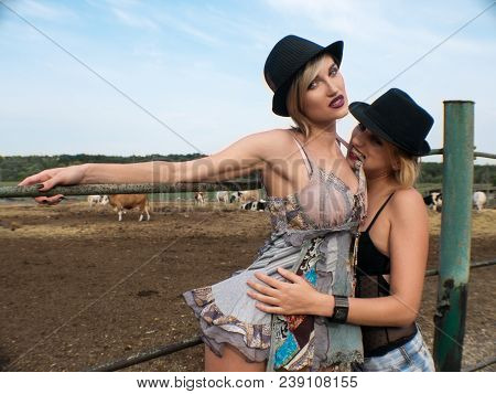 Couple Of Young Sexy Lesbian Girls Laught In Light Dresses Flirt, Play In The Pasture In Hayloft In 