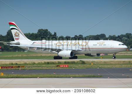 Dusseldorf, Germany - July 8, 2013: Airbus A330 Of Etihad Airways In Dusseldorf Airport, Germany. Et