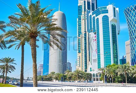 Doha, Qatar - February 13, 2018: Corniche Street Is Perfect Place For Walk And Enjoy The Futuristic 