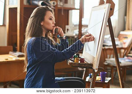 Young Beautiful Girl, Female Artist Painter Thinking Of A New Artwork Idea And Ready To Make The Fir