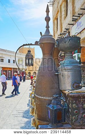Doha, Qatar - February 13, 2018: The Showpiece Of Large Dallah Coffee Pot In Front Of The Antique St