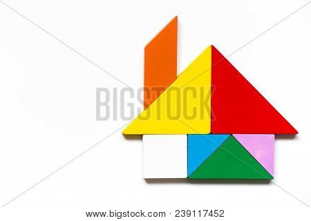 Color Wood Tangram Puzzle In Home Shape On White Background