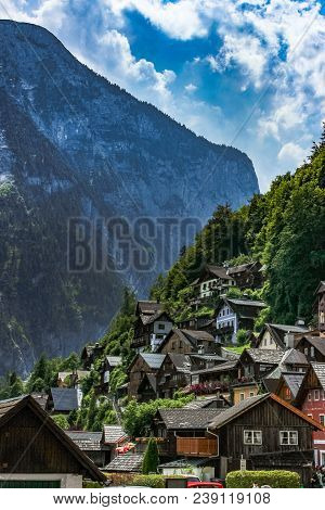 Hillside Homes In The Historic Hallstatt Village In The Austrian Alps, Region Of Salzkammergut, Aust