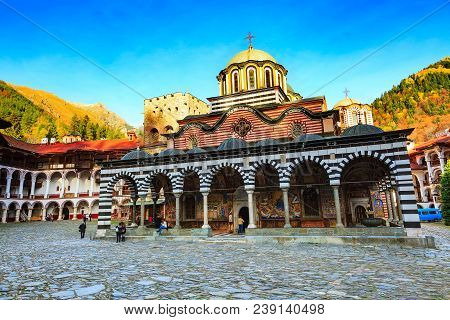 Rila, Bulgaria - October 27, 2017: Rila Monastery View With Autumn Mountain Trees At Background