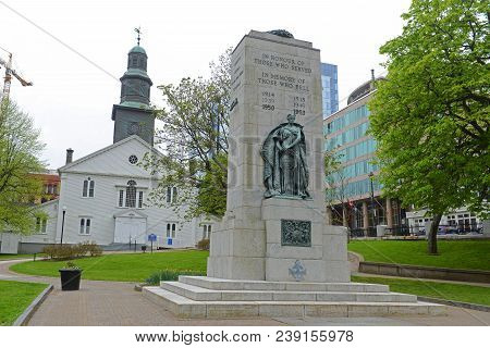 Halifax, Ns, Canada - May 22, 2016: Cenotaph And St Paul`s Anglican Church On Grand Parade Square In