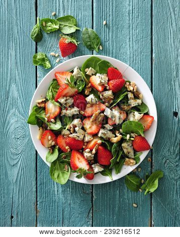 Fresh Strawberry Salad With Spinach Leaves, Blue Cheese And Walnuts.