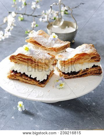 Puff Pastry Cake With Whipped Sour Cream And Cherry Preserves.