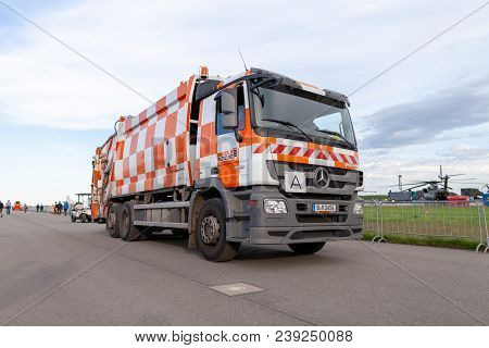 Berlin / Germany - April 28, 2018: German Garbage Truck From Berlin Recycling Drives On Airfield Sch