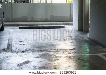 Empty Space Car Park Interior At The Office., Interior Of Parking Garage With Car And Vacant Parking