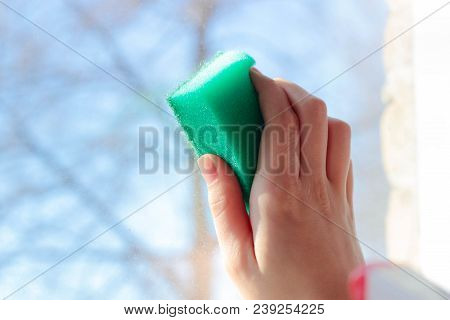 A Hand With A Sponge Washes The Window Dirty, Cleaning.