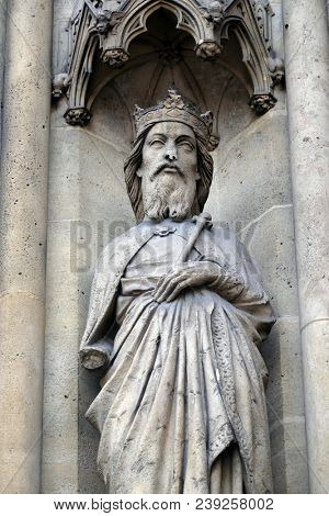 PARIS, FRANCE - JANUARY 05: Saint Gontran, statue on the portal of the Basilica of Saint Clotilde in Paris, France on January 05, 2018.