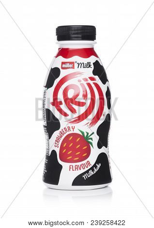 London, Uk - May 03, 2018: Plastic Bottle Of Muller Strawberry Drink On White.