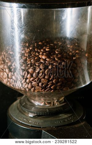Coffee Beans In A Grinder. Aromatic Invigorating Morning Hot Drink. Roasted Arabica Or Robusta For Y