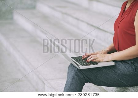 Cropped Image Of Business Woman Aswering E-mails