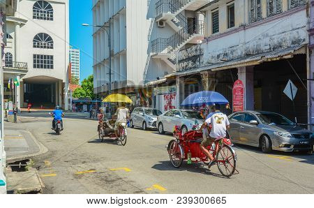 George Town, Malaysia - Mar 10, 2016. Rickshaws On Street In George Town, Malaysia. Established In 1