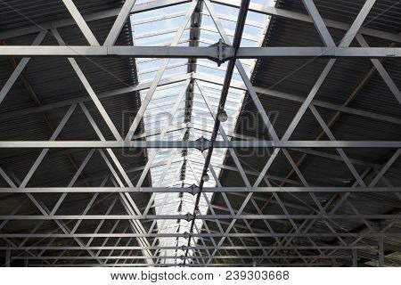 The Roof Design Of A Modern Barn With A Solid Window And Ventilation