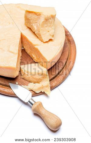 Whole Round Head And Pieces Of Parmesan Or Parmigiano Hard Cheese
