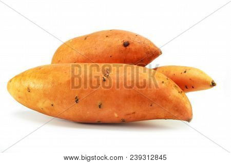 Sweet Potatoes Isolated On A White Background