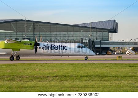 Gdansk, Poland - May 5, 2018: Passenger Plane Of Arbaltic Taxiing At Lech Walesa Airport In Gdansk.