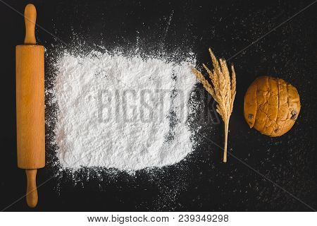 Top View Of Baking Concept , Rolliing With Baking Powder And Bread With