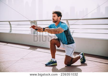 Beautiful Man Doing Work Out And Different Exercises Outdoor