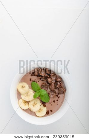 Chocolate Pudding, Banana And Herbs In