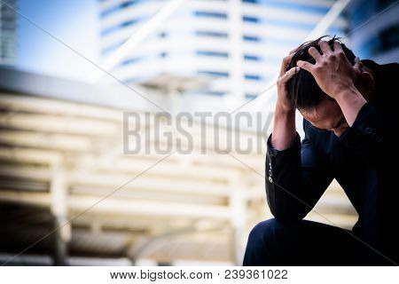 Asian Businessman Feel Sad And Frustrated Upset Fail In Life.