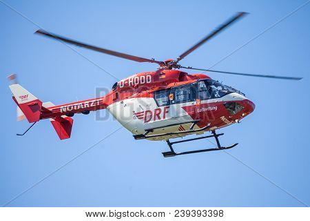 Delmenhorst / Germany - May 06, 2018: Eurocopter Bk-117 From Drf Luftrettung Flies Over Landing Side