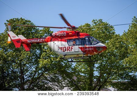 Delmenhorst / Germany - May 06, 2018: Eurocopter Bk-117 From Drf Luftrettung Flies Over Landing Side