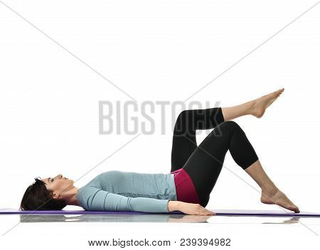 Mother Woman Exercising Doing Postnatal Workout. Female Fitness Instructor Stretching Hands And Legs