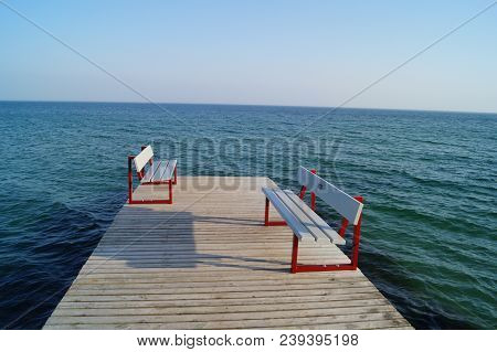 Bench On A Pier Of Burgtiefe Fehmarn Island In Schleswig Holstein Germany