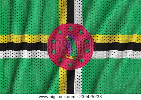 Dominica Flag Printed On A Polyester Nylon Sportswear Mesh Fabric With Some Folds
