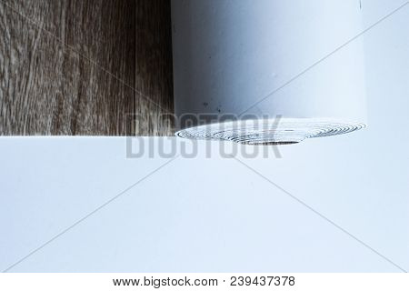 Roll Of Linoleum On A White Background