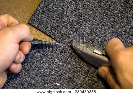 Gray Carpet Roll Is Frozen And Sliced