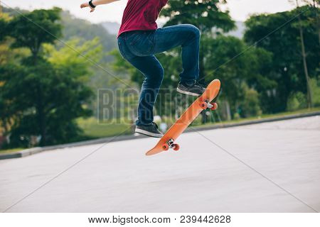 One Young Skateboarder Sakteboarding On Parking Lot