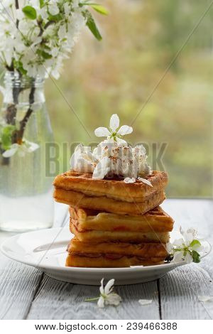 On Saucer In Spring Composition On Wooden Background.spring Still Life With Cherry Blossoms