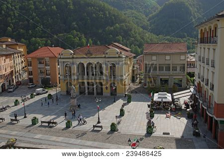 Varallo Sesia, Italy - 25 April 2018: Local Life In Vittorio Emanuele Square, Varallo Sesia, Is A To