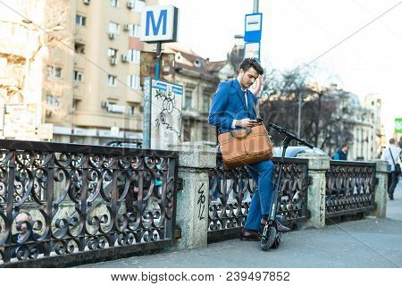 Bucharest, Romania, - Octomber 26, 2017: Using Electric Scooter On The Street On A Sunny Day With Sa