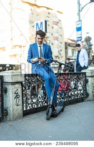 Bucharest, Romania, - Octomber 26, 2017: Using Electric Scooter On The Street On A Sunny Day With Sa