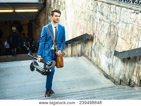 Bucharest, Romania, - Octomber 26, 2017: Using Electric Scooter On The Street On A Sunny Day With Sa