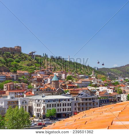 Tbilisi, Old Part Of Town With Cafe, Little Restaurants, Cobbled Pavement And Antique Buildings. Cat