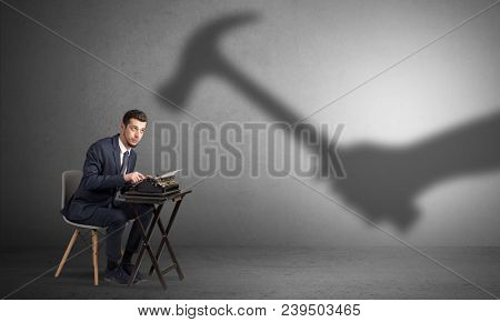 Shadow threatening hard worker man who is afraid