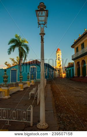 Trinidad, Cuba. The Bell Tower Of San Francisco De Asis. Street In The Center Of The Cuban City.