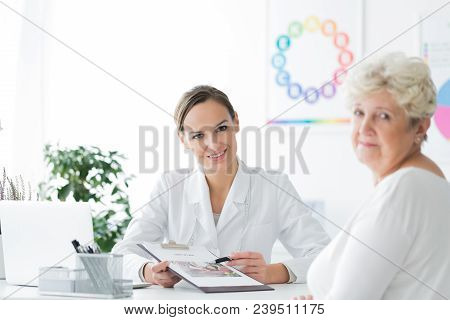 Dietician In Office With Patient