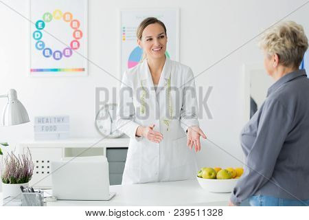 Dietician Welcoming Elderly Client