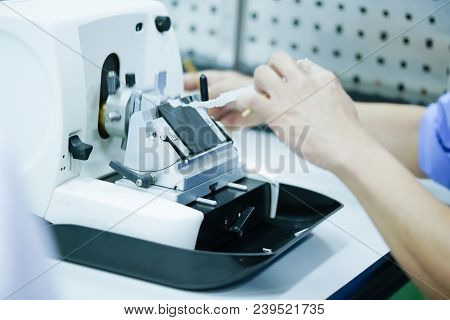 Rotary Microtome Section For Diagnosis In Pathology Make Microscope Slide Histology. Human Tissue Eq