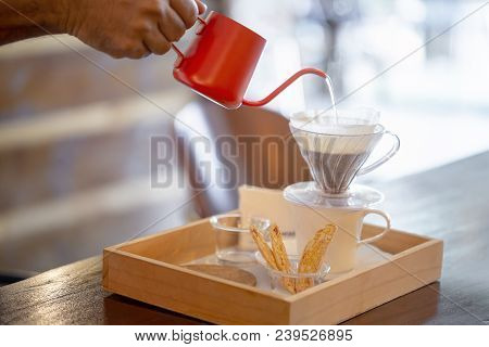 Close Up Of Siphon Vacuum, Coffee Cup And Siphon Vacuum Coffee Maker At Shop.